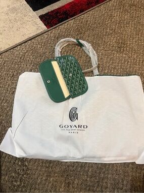 green Goyard Saint Louis PM tote bag with matching pouch.